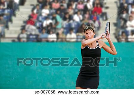 Female Tennis Player Swinging Racquet, Racket View Large Photo Image Stock Photo - Female Tennis Player Swinging Racquet, Racket. Fotosearch