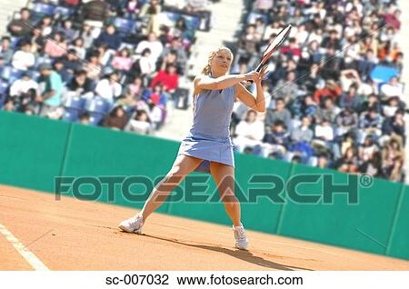 Stock Image - Front View of Female Tennis Player. Fotosearch