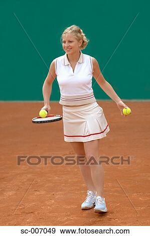 Stock Photo - Front View of Female Tennis Player. Fotosearch