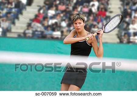 Stock Photo - Front View of Female Tennis Player. Fotosearch