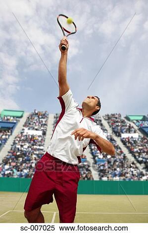 Stock Photography - Front View of Male Tennis Player Serving. Fotosearch