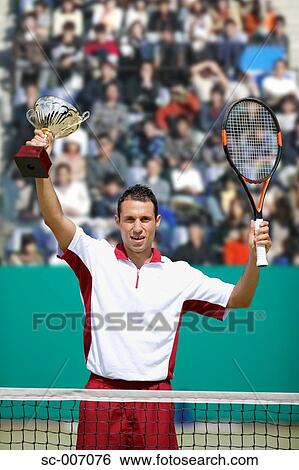 Stock Photograph - Male Tennis Player Celebrating, . Fotosearch