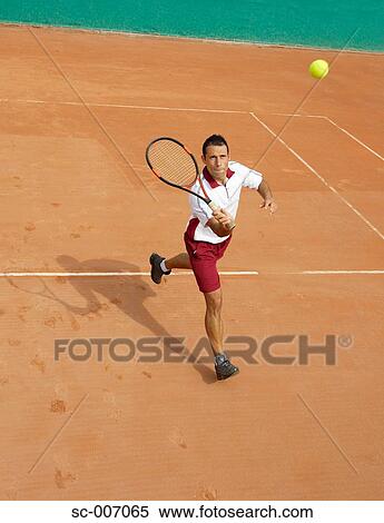 Male Tennis Player Running for Ball View Large Photo Image Stock Photography - Male Tennis Player Running for Ball. Fotosearch