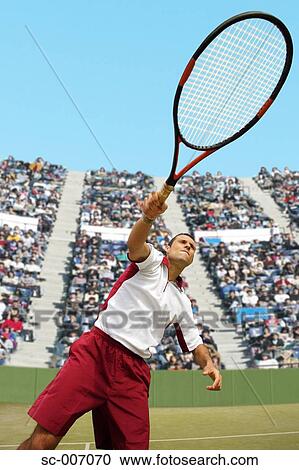 Stock Image - Male Tennis Player With Racquet, Racket. Fotosearch