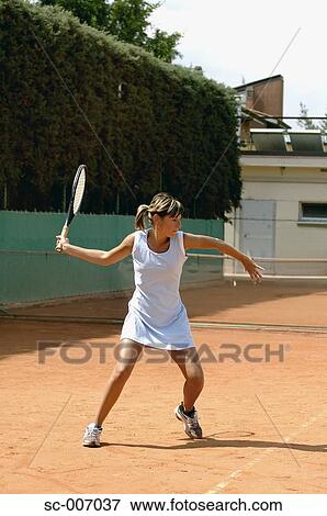 Stock Photo - Side View of Female Tennis Player. Fotosearch
