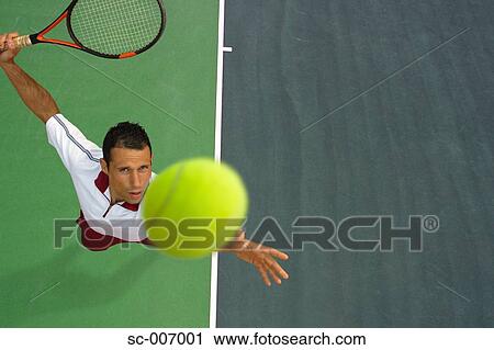 Top View of Male Tennis Player Mid-Serve View Large Photo Image Stock Image - Top View of Male Tennis Player Mid-Serve. Fotosearch