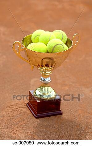 Trophy with Tennis Balls View Large Photo Image Stock Image - Trophy with Tennis Balls. Fotosearch