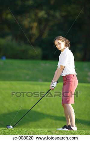 A young woman contemplates before playing a shot View Large Photo Image Stock Image - A young woman contemplates before playing a shot. Fotosearch