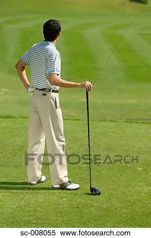 Male golfer contemplating his shot View Large Photo Image Stock Photography - Male golfer contemplating his shot. Fotosearch
