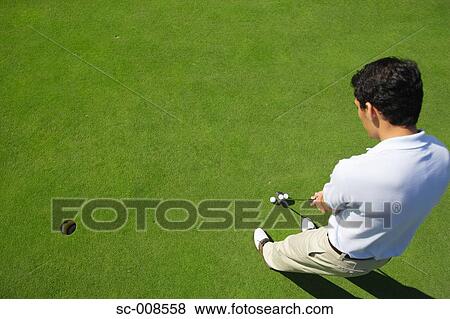 Male Golfer On a Putting Green View Large Photo Image Stock Photo - Male Golfer On a Putting Green. Fotosearch