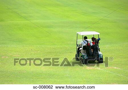 Rear view of two golfers sitting in a golf cart View Large Photo Image Stock Image - Rear view of two golfers sitting in a golf cart. Fotosearch