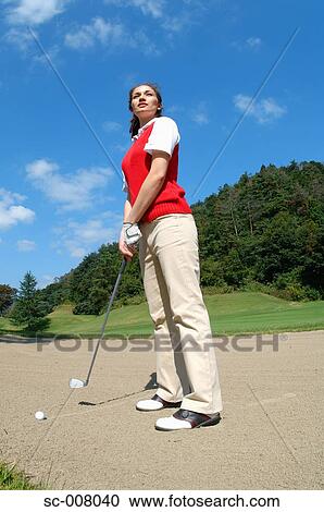 Woman contemplating before playing a bunker shot View Large Photo Image Stock Image - Woman contemplating before playing a bunker shot. Fotosearch