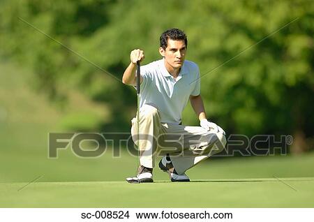 Young Man Plans a Golf Shot View Large Photo Image Picture - Young Man Plans a Golf Shot. Fotosearch