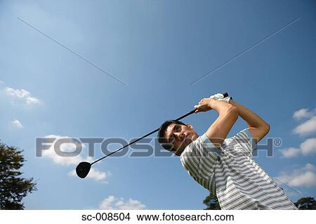 Picture - Young Man Playing Golf. Fotosearch