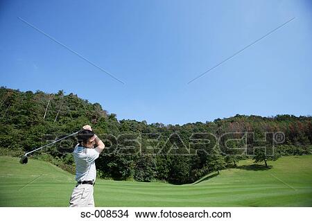 Young Man Playing Golf View Large Photo Image Picture - Young Man Playing Golf. Fotosearch