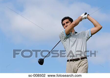 Young Man Playing Golf View Large Photo Image Stock Image - Young Man Playing Golf. Fotosearch