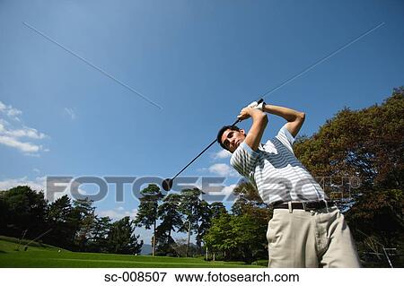 Young Man Playing Golf View Large Photo Image Stock Photo - Young Man Playing Golf. Fotosearch