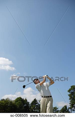 Stock Photography - Young Man Playing Golf. Fotosearch