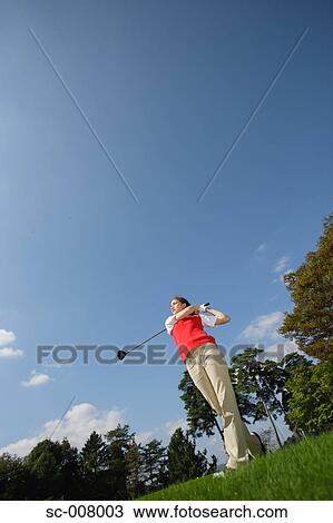 Young woman playing golf View Large Photo Image Stock Image - Young woman playing golf. Fotosearch
