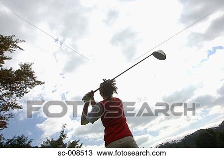 Young Woman Playing Golf View Large Photo Image Stock Image - Young Woman Playing Golf. Fotosearch