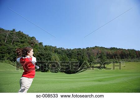 Young Woman Playing Golf View Large Photo Image Stock Image - Young Woman Playing Golf. Fotosearch