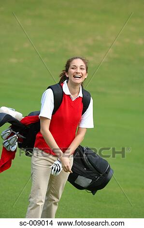 Happy female golfer View Large Photo Image Picture - Happy female golfer. Fotosearch