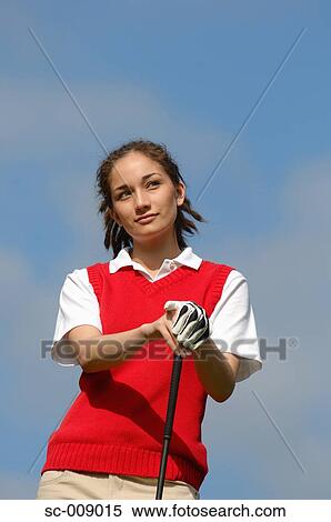 Portrait of a female golfer on a sunny day View Large Photo Image Stock Photography - Portrait of a female golfer on a sunny day. Fotosearch