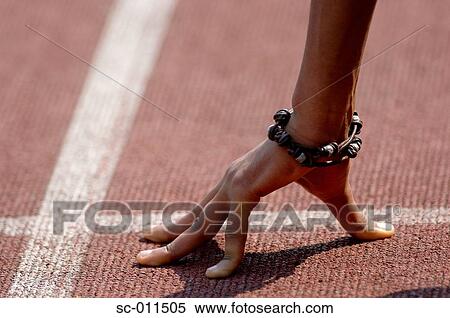 Hand of a Male Runner Pressed Against the Surface of a Track View Large Photo Image Stock Photography - Hand of a Male Runner Pressed Against the Surface of a Track. Fotosearch