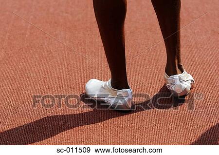Stock Photo - Legs of a Male Runner. Fotosearch