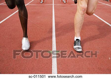 Stock Image - Legs of Male Runners Sprinting. Fotosearch