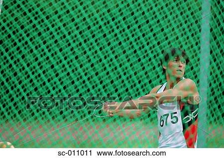 Male Hammer Thrower Winding Up View Large Photo Image Stock Image - Male Hammer Thrower Winding Up. Fotosearch