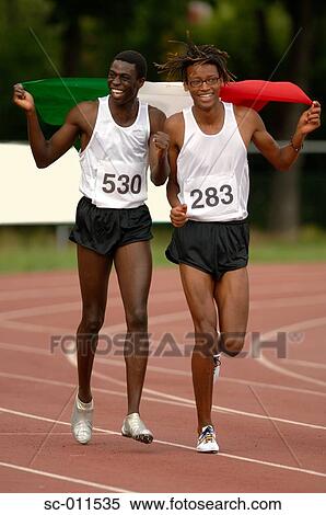Stock Photography - Male Runners Carrying Italian Flag. Fotosearch