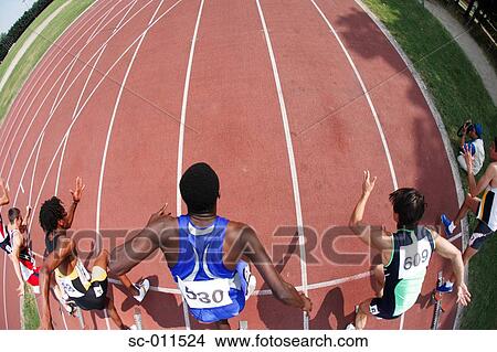 Male Runners Leaping Off Starting Blocks View Large Photo Image Picture - Male Runners Leaping Off Starting Blocks. Fotosearch