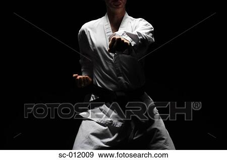 Blackbelt Punching View Large Photo Image Stock Photo - Blackbelt Punching. Fotosearch