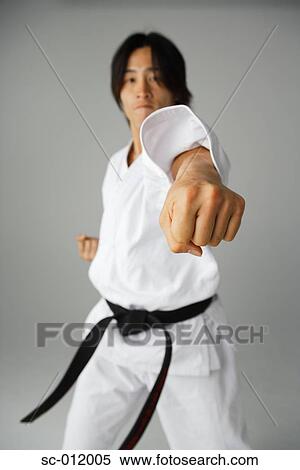 Blackbelt Punching View Large Photo Image Stock Photography - Blackbelt Punching. Fotosearch