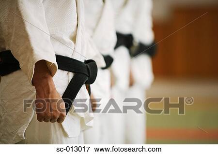 Stock Photo - Members of a Judo Dojo Lined Up. Fotosearch