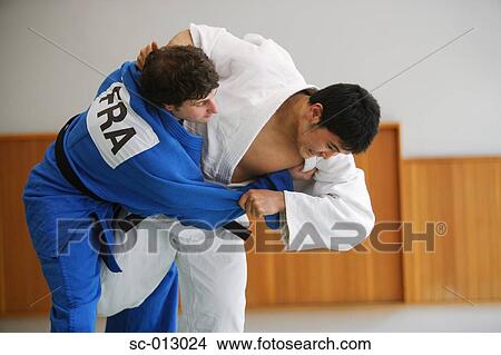 Picture - Two Men Competing in a Judo Match. Fotosearch