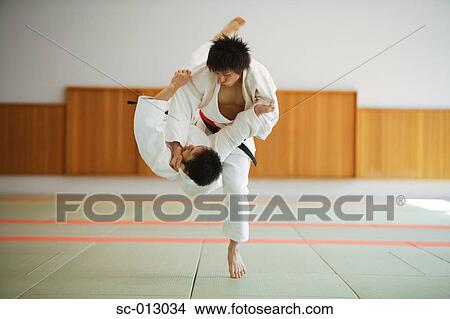 Picture - Two Men Competing in a Judo Match. Fotosearch