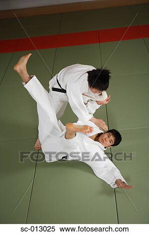 Stock Photography - Two Men Competing in a Judo Match. Fotosearch