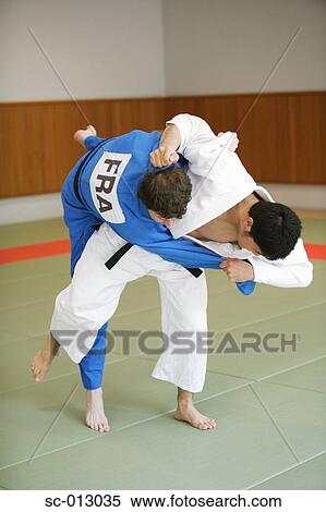 Stock Photography - Two Men Competing in a Judo Match. Fotosearch