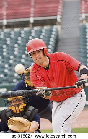 Baseball player bunting the ball View Large Photo Image Stock Photo - Baseball player bunting the ball. Fotosearch