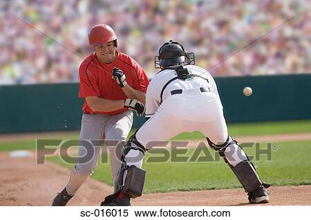 Baseball player charging the catcher View Large Photo Image Stock Photography - Baseball player charging the catcher. Fotosearch