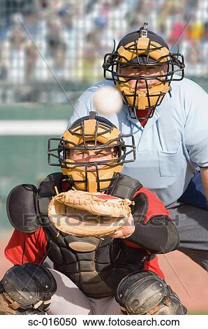 Stock Image - Catcher and Umpire. Fotosearch