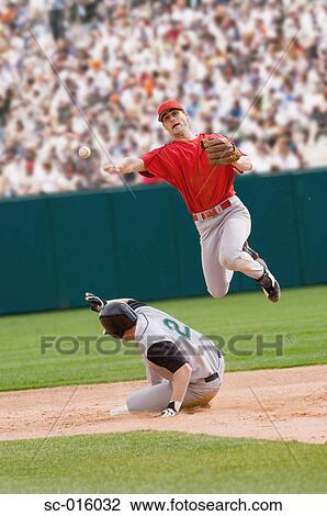 Going for a double play View Large Photo Image Stock Image - Going for a double play. Fotosearch