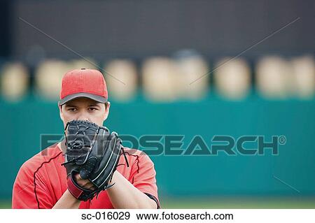 Stock Photo - Pitcher eying home plate. Fotosearch