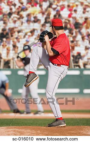 Stock Image - Pitcher winding up. Fotosearch