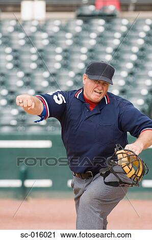 Stock Image - Umpire calling out. Fotosearch