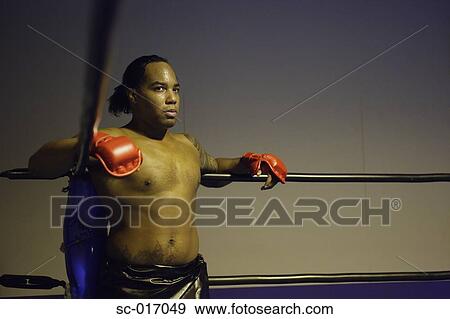 Stock Photo - Fighter taking his corner. Fotosearch