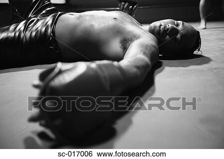 Stock Photograph - Knocked out. Fotosearch