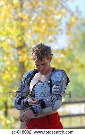 Stock Image - Mountain Biker and his Gear. Fotosearch